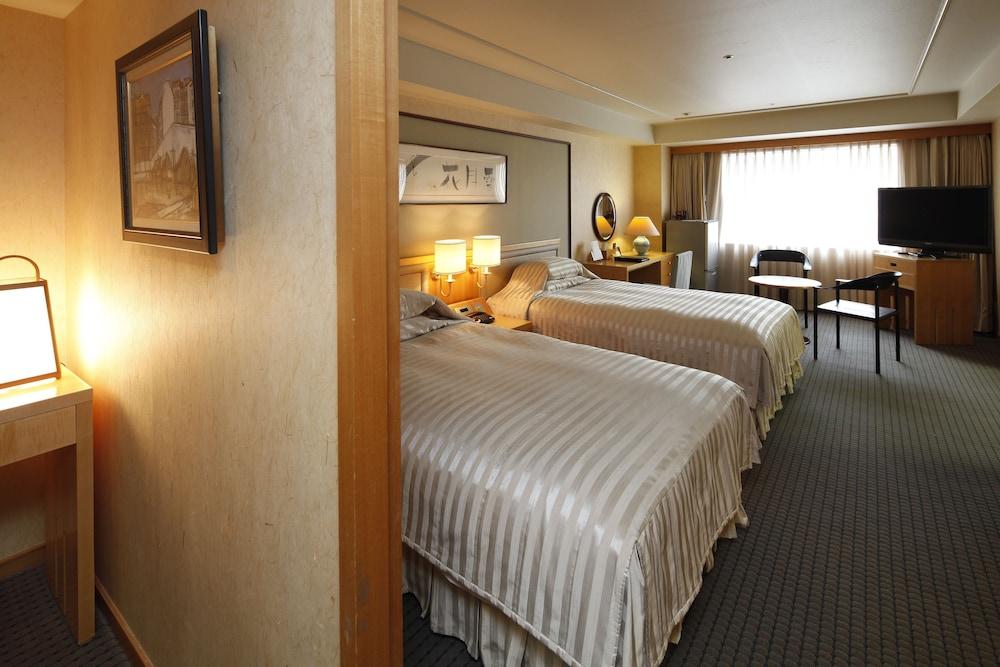 Miyako Hotel Gifu Nagaragawa Exterior foto A room at the hotel